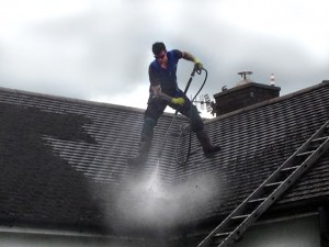 Professional roof cleaning services by Roofman.