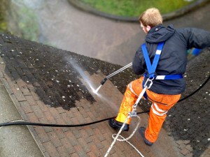 Professional roof cleaning services by Roofman.