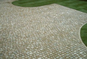 Professional driveway cleaning services by Roofman.