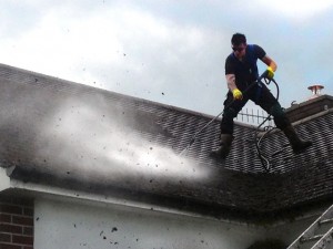Professional roof cleaning services by Roofman.