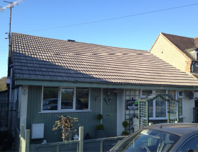Example of a roof cleaned by Roofman.